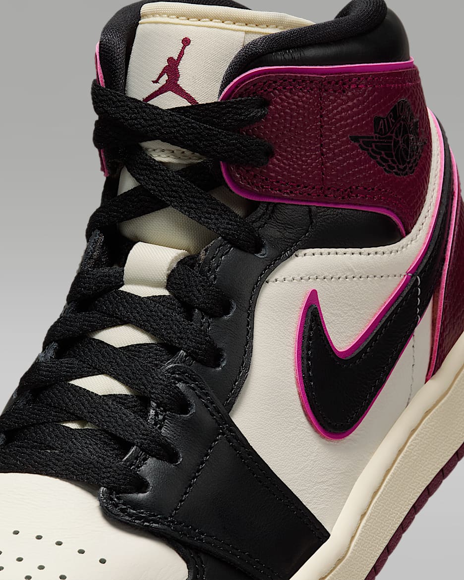 Pink and black high top jordans on sale